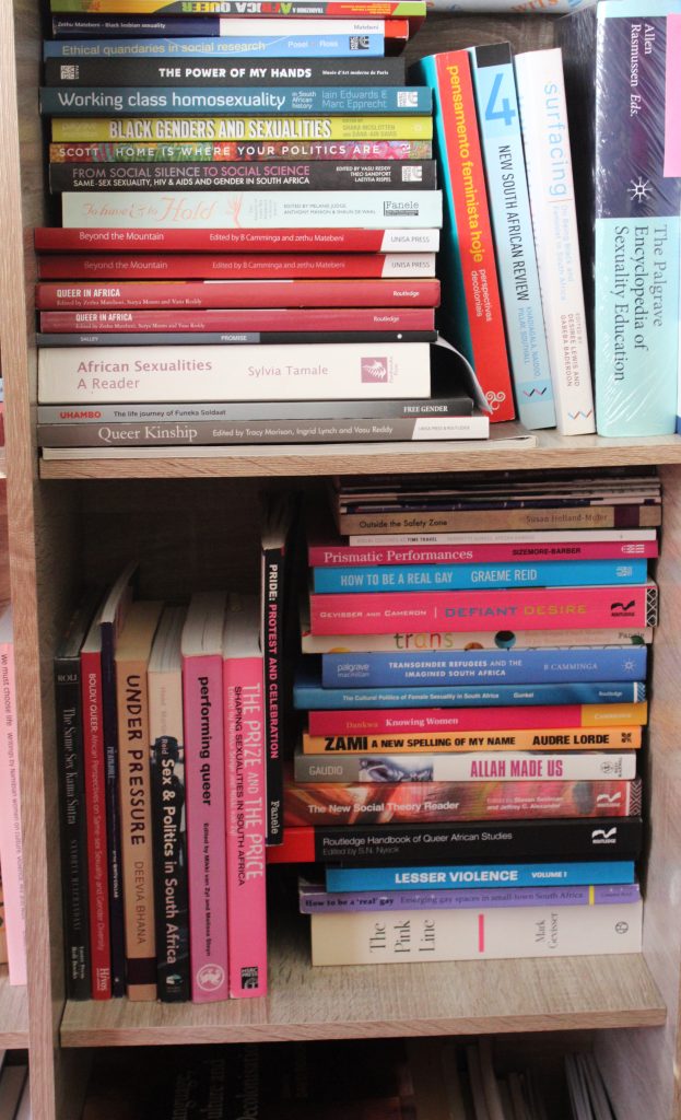 Books from the MATI Research Collection on a shelf